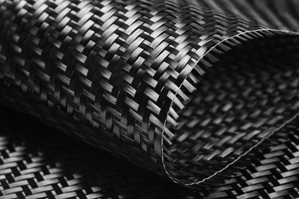 Close-up of woven 100% carbon fibre material, the same construction used in the Flowflax pole